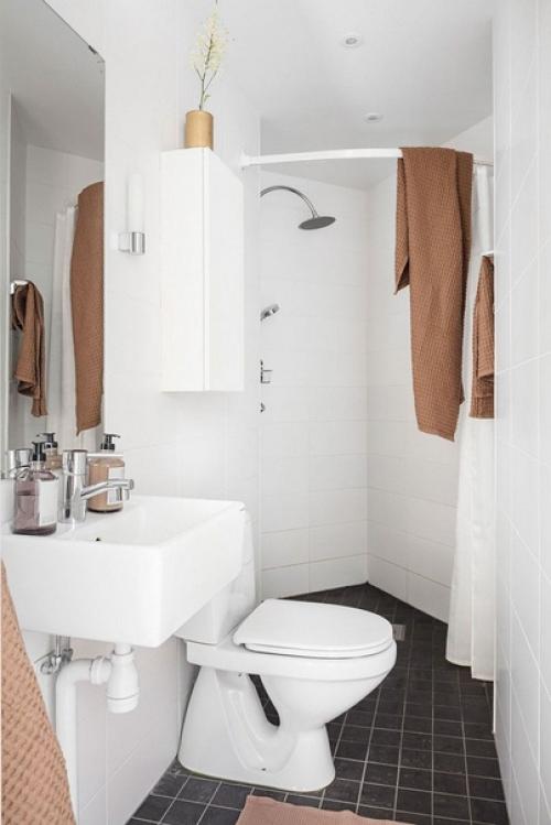 Спокойная и уютная квартира с тёплыми акцентами в Швеции (32 кв. 09