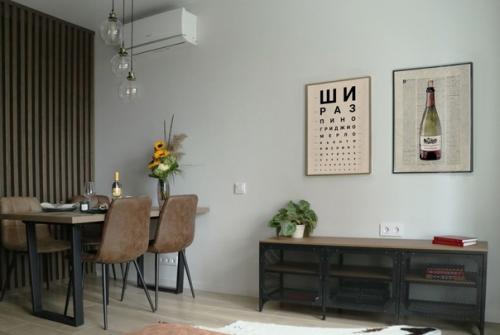 Современный, брутальный интерьер кухни - гостиной в квартире молодого холостяка. 05