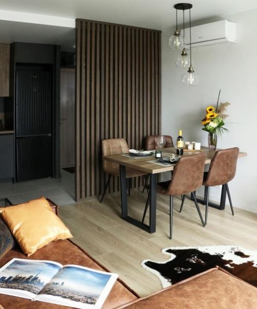 Современный, брутальный интерьер кухни - гостиной в квартире молодого холостяка. 06