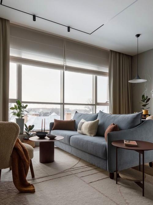 Дизайн небольшой квартиры, который отражает единение города и природы. 01