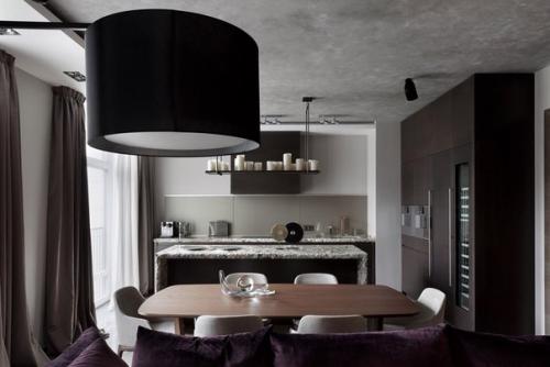 Визуальное разграничение зоны приготовления, питания и отдыха мебелью является частым приемом в интерьерах кухонь, совмещенных с гостиной. 05