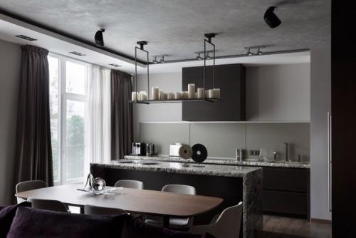 Визуальное разграничение зоны приготовления, питания и отдыха мебелью является частым приемом в интерьерах кухонь, совмещенных с гостиной. 04