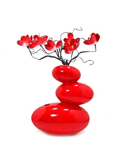 Ваза - это стильный аксессуар, который придает жилью ощущение уюта и гармонии. 05