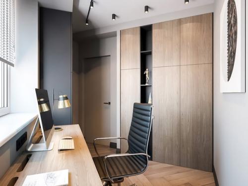 Интерьер кабинета. Конфигурация квартиры диктовала свои условия и дизайнеры получили достаточно интересное планировочное решение. 01