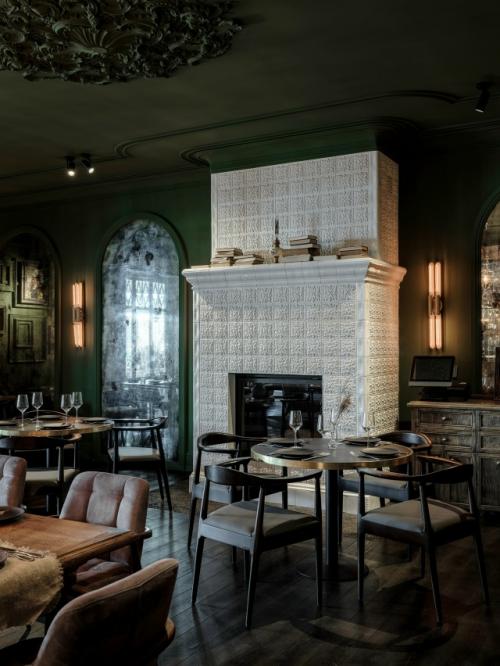 Классический камин в облицовке из коллекции Элеганс в белом цвете стал центральным акцентом основного зала ресторана гроза в Костроме. 05
