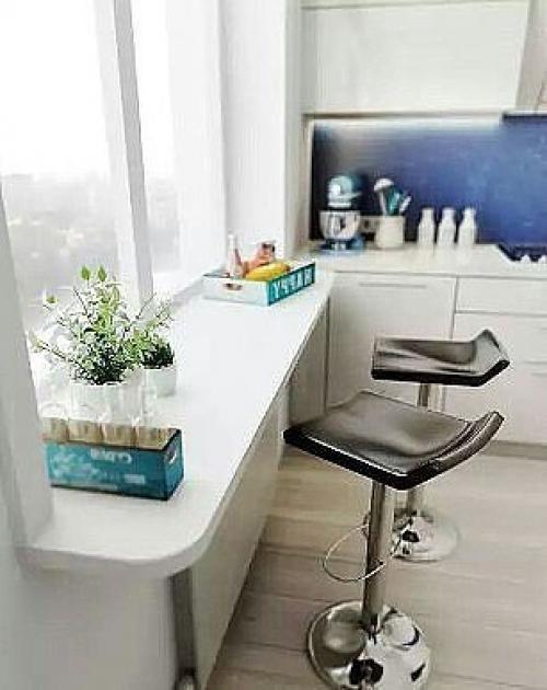 Одним из наиболее модных трендов в дизайне интерьеров считается использование кухонных столешниц, совмещенных с подоконником. 04