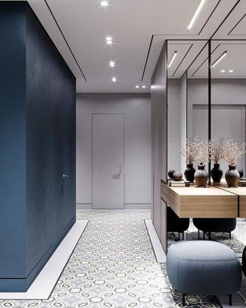 Интерьер прихожей.  Стильный дизайн с темными стенами и огромным зеркалом от пола до потолка. 01