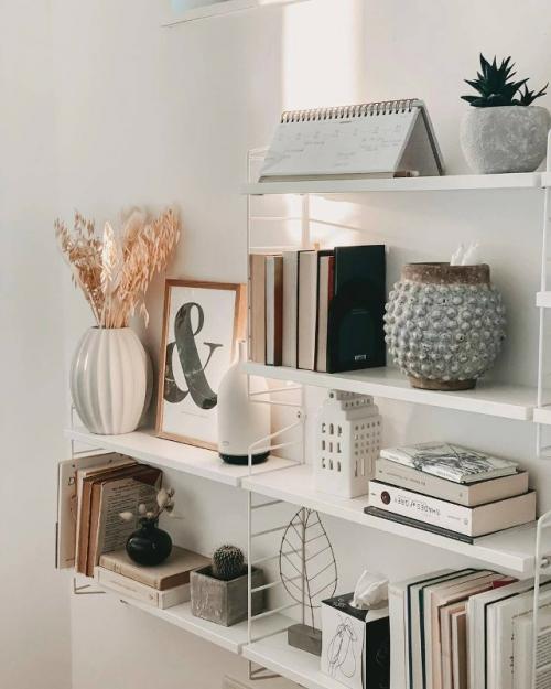 Серый цвет, дерево и интересный декор: уютная квартира в скандинавском стиле. 02