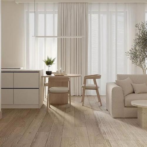 Светлый и воздушный интерьер с интересным слиянием кухни и гостиной. 03