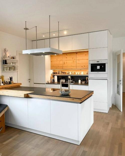 Серый цвет, дерево и интересный декор: уютная квартира в скандинавском стиле.
