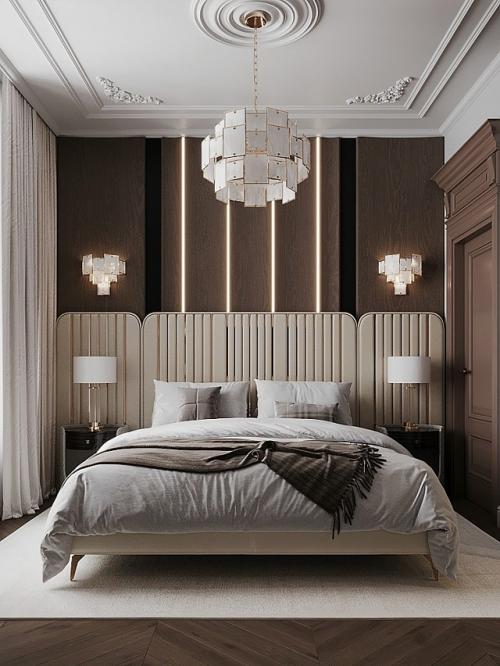 Интерьер спальни выполнен в современном стиле с элементами классики.  