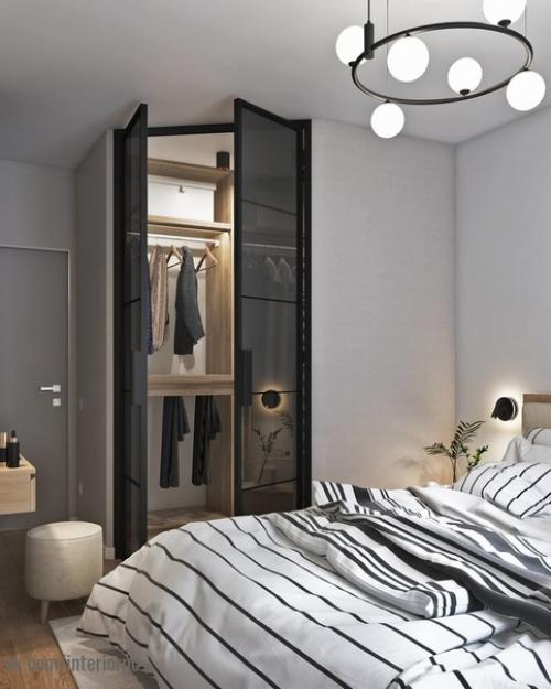 Проект квартиры выполнен в едином стиле с применением светлых и темных оттенков в интерьере. 06