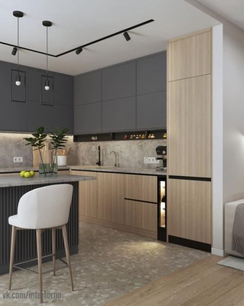 Проект квартиры выполнен в едином стиле с применением светлых и темных оттенков в интерьере. 05