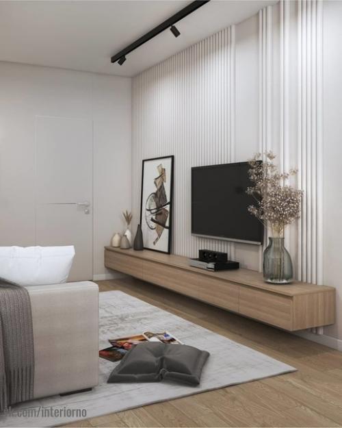 Проект квартиры выполнен в едином стиле с применением светлых и темных оттенков в интерьере. 01