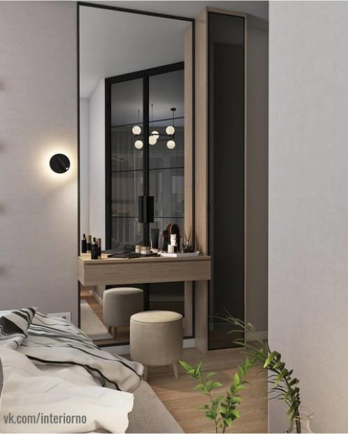 Проект квартиры выполнен в едином стиле с применением светлых и темных оттенков в интерьере. 08