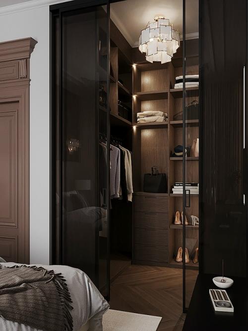 Интерьер спальни выполнен в современном стиле с элементами классики. 03