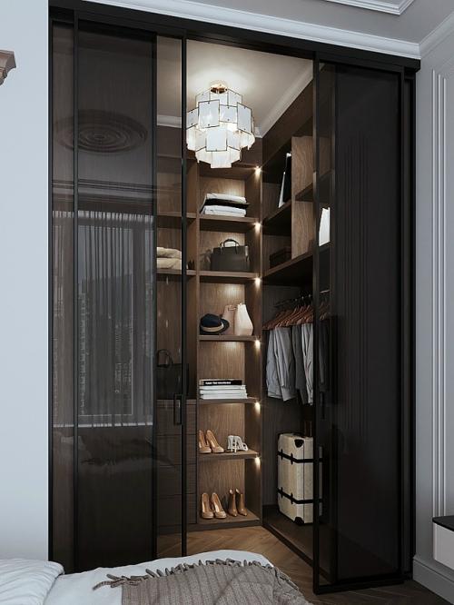 Интерьер спальни выполнен в современном стиле с элементами классики. 05