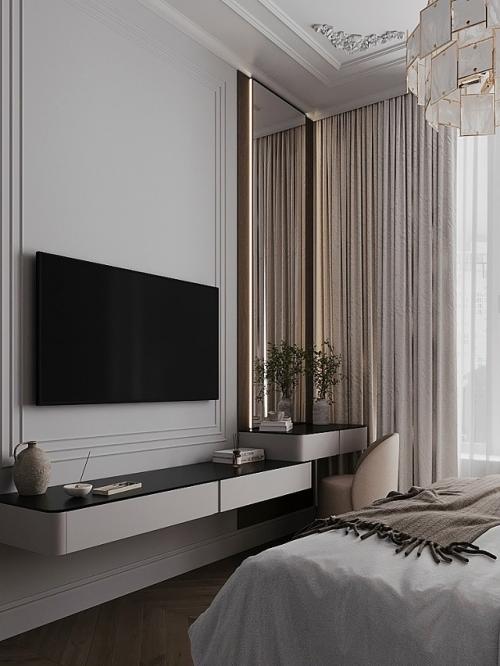 Интерьер спальни выполнен в современном стиле с элементами классики. 01