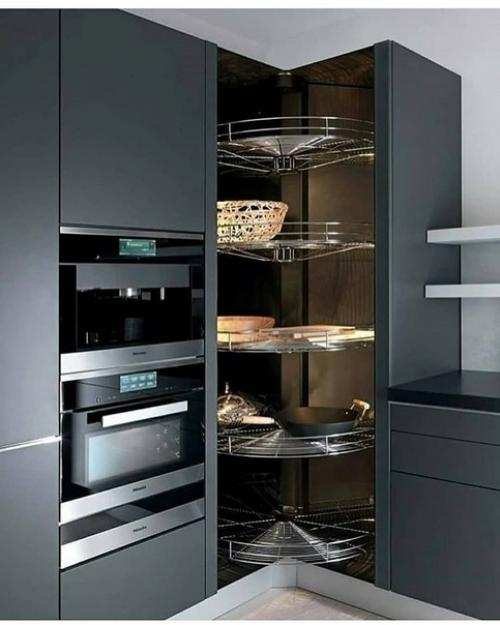 Угловой шкаф в кухонном гарнитуре может выглядеть и так. 04