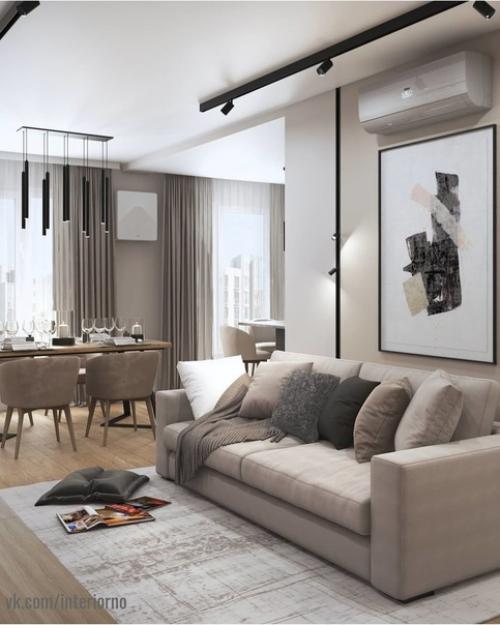 Проект квартиры выполнен в едином стиле с применением светлых и темных оттенков в интерьере. 02