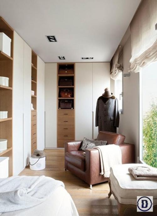 Апартаменты в Барселоне. Сердце этого интерьера - большой книжный шкаф с коллекцией книг о путешествиях и о странах мира. 05