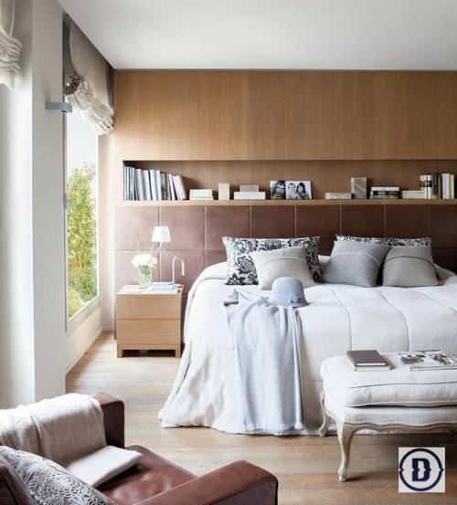 Апартаменты в Барселоне. Сердце этого интерьера - большой книжный шкаф с коллекцией книг о путешествиях и о странах мира. 04