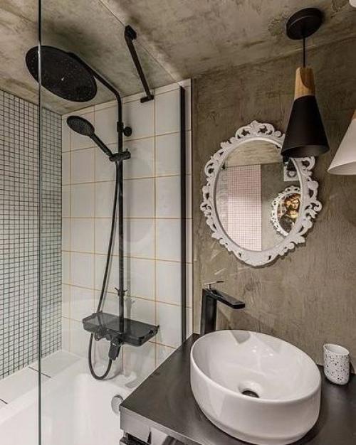 Комфортный интерьер маленькой студии с высокими потолками, что позволило оформить антресольный этаж и обустроить там спальню. 08