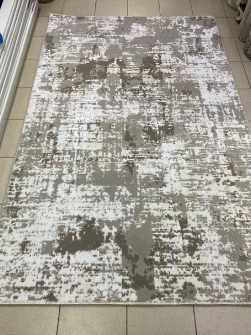 Недорогой, но стильный ковёр Richi для любителей современной абстракции. 03