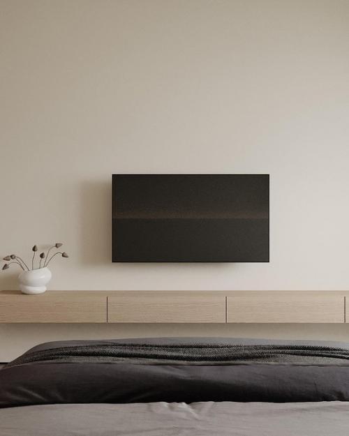 Современная спальня выполнена в стиле минимализма, где каждая деталь продумана для создания атмосферы спокойствия и уюта. 03