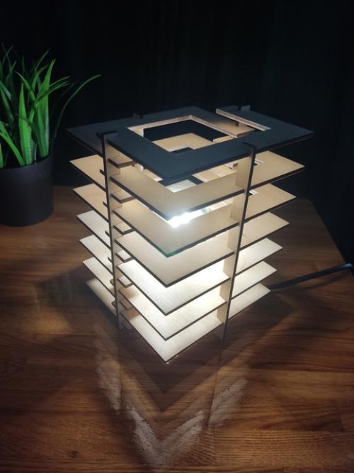 Настольный светильник - это стильный и функциональный аксессуар, который станет отличным дополнением к любому интерьеру. 01