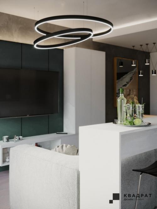 Дизайн гостиной. Мы сделали ставку на яркие акценты, оформив стену в зоне TV в насыщенном зеленом цвете. 02