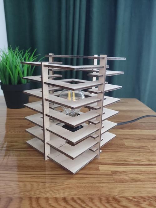 Настольный светильник - это стильный и функциональный аксессуар, который станет отличным дополнением к любому интерьеру. 05