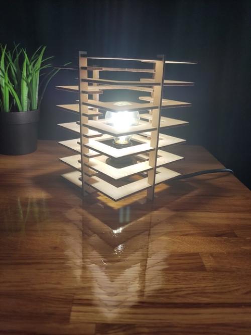 Настольный светильник - это стильный и функциональный аксессуар, который станет отличным дополнением к любому интерьеру. 04