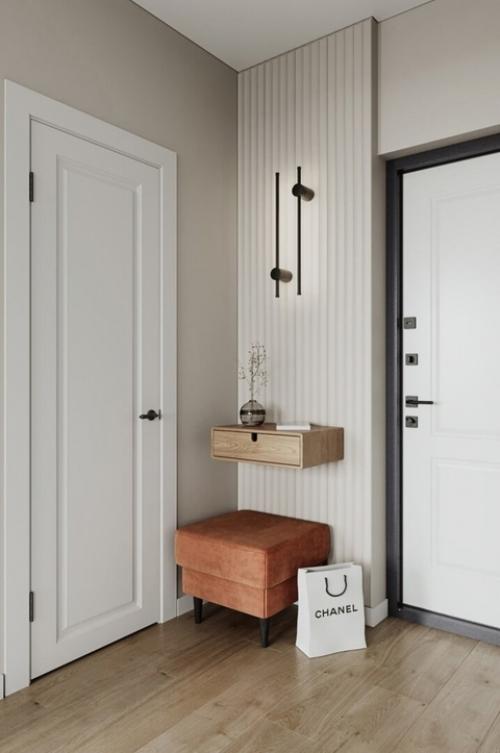 Проект квартиры площадью 40 квадратных метров, разработанный для современной девушки, - это уютное и элегантное пространство. 04