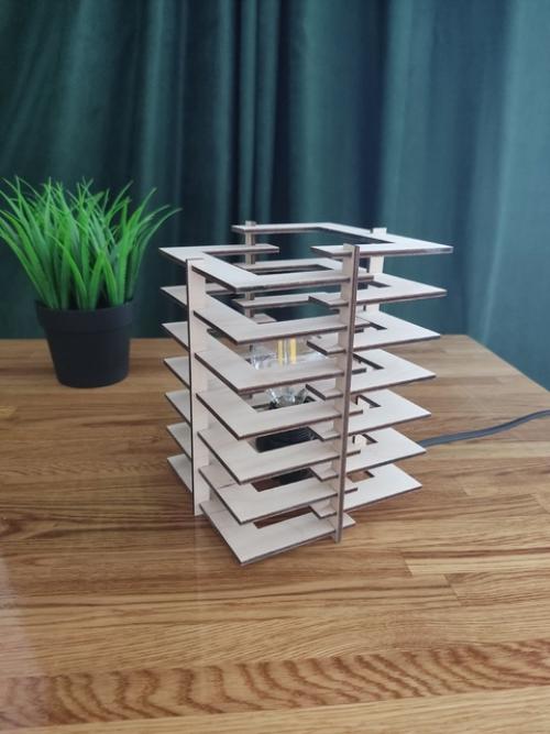 Настольный светильник - это стильный и функциональный аксессуар, который станет отличным дополнением к любому интерьеру. 02