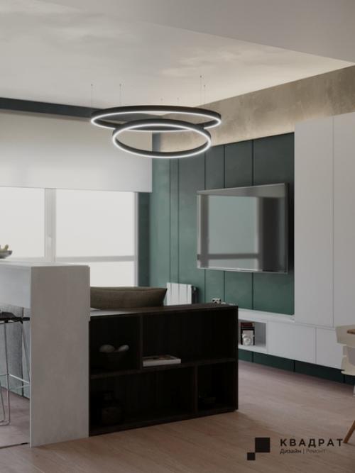 Дизайн гостиной. Мы сделали ставку на яркие акценты, оформив стену в зоне TV в насыщенном зеленом цвете. 01