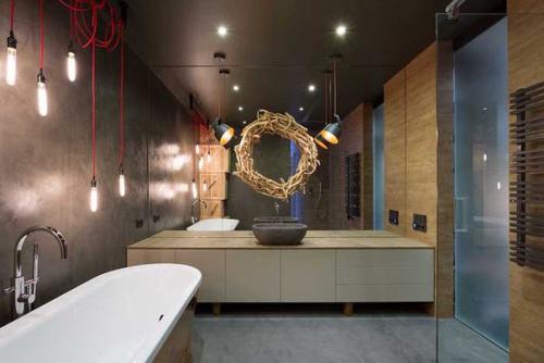 Дизайн роскошной холостяцкой квартиры в стиле лофт, расположенной в новом доме в центре Киева, чудесно подходит для современного одинокого мужчины. 09