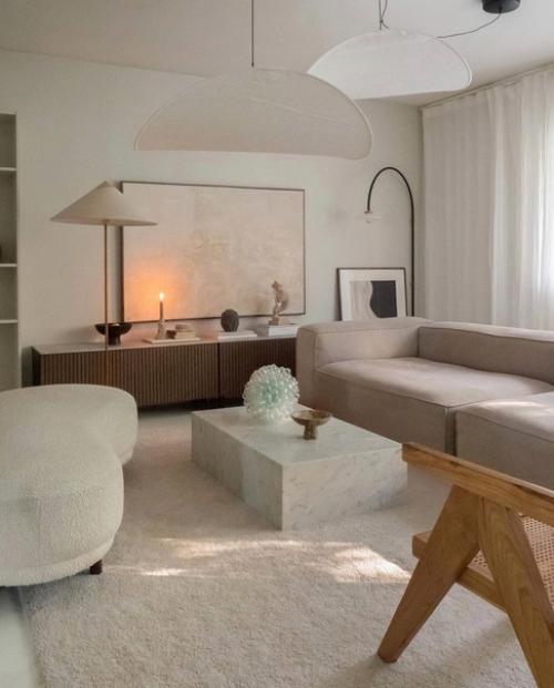 Этот уютный дом представляет собой компромисс из тёплых бежевых оттенков и стильного фирменного скандинавского декора. 05