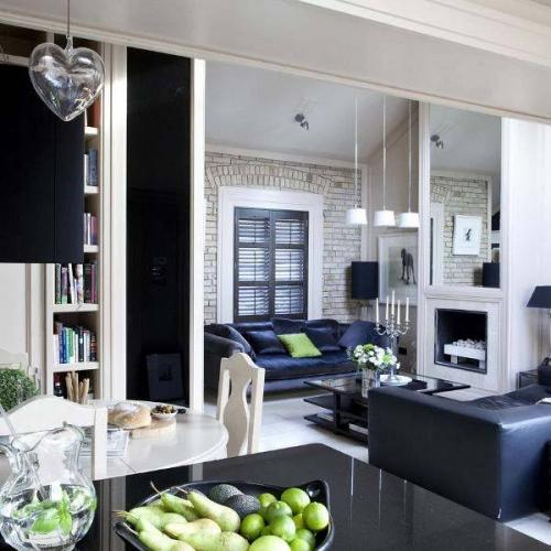 Благодаря сочетанию светлых и темных поверхностей, а также различных фактур, эта квартира выглядит объемно. 08