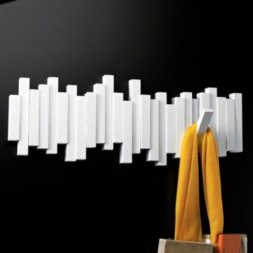 Настенная вешалка в прихожей - это практичная деталь интерьера, которая способна разрешить сразу несколько задач. 08