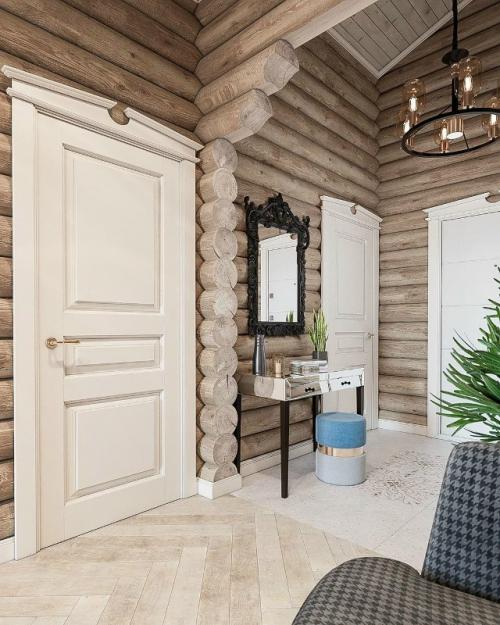 Удивительно гармоничное пространство, где современный интерьер мягко переплетается с природной фактурой бревенчатых стен. 04