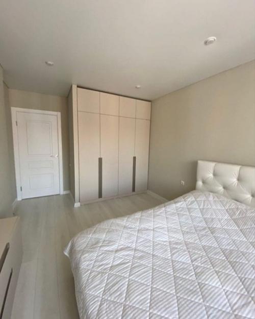 Дизайн квартиры получился спокойным без вырвиглазных красок. 08