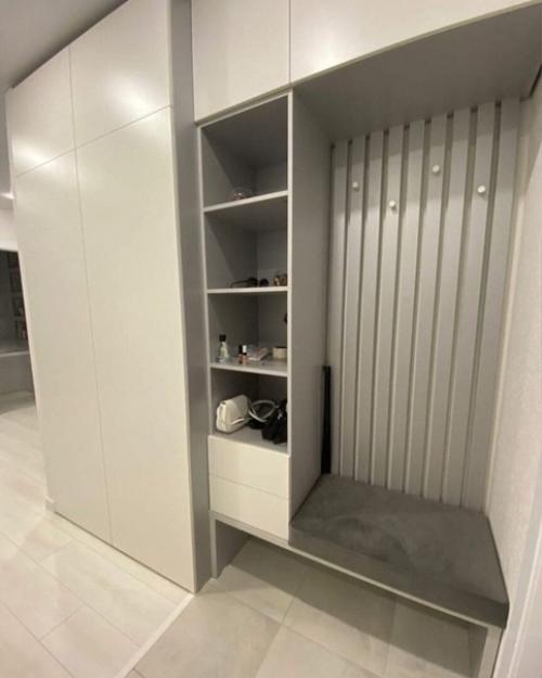 Дизайн квартиры получился спокойным без вырвиглазных красок. 07