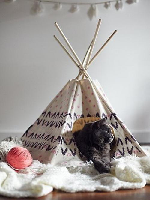 Домик для кошки может стать оригинальным украшением интерьера. 02