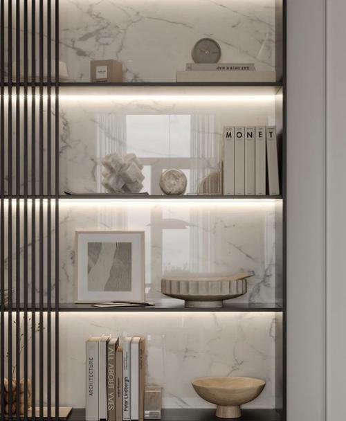 В этой небольшой гостиной важно было создать стильный интерьер с минимумом мебели и аксессуаров. 04