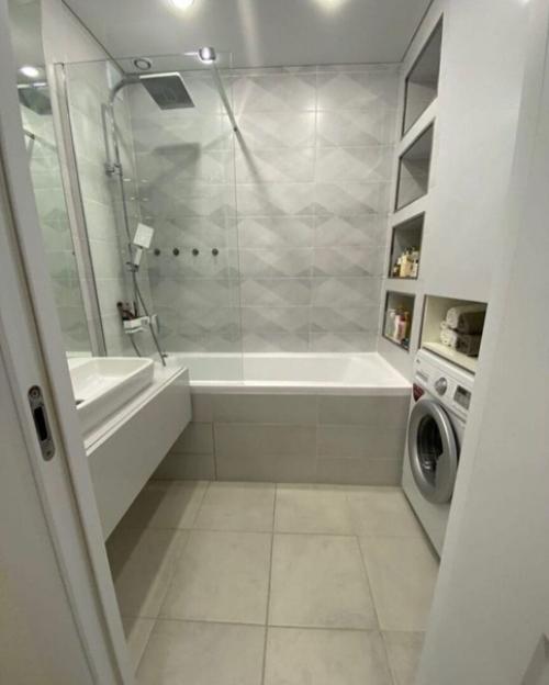 Дизайн квартиры получился спокойным без вырвиглазных красок. 04