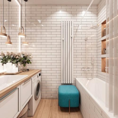 Ванная комната.  Помещение небольшое, но за счет светлой плитки выглядит очень даже просторно.