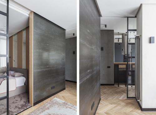 Интерьер с отсылками к стилю лофт и преобладанием черного цвета и бетона. 03