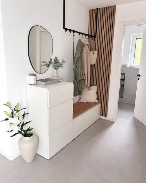 Основа этого скандинавского интерьера состоит из белого и бежевого цвета, теплого дерева и капли зеленых растений. 06