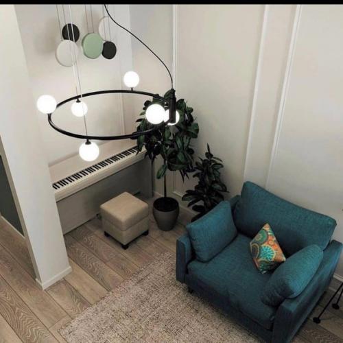 Стильный вариант дизайна квартиры в светлых тонах в сочетании с оттенком зеленого. 02